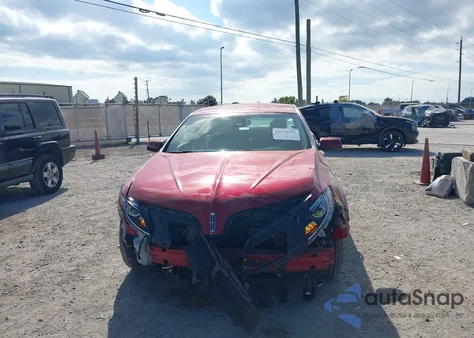 2014 Lincoln Mks from USA, damaged, VIN 1LNHL9DK6EG601238